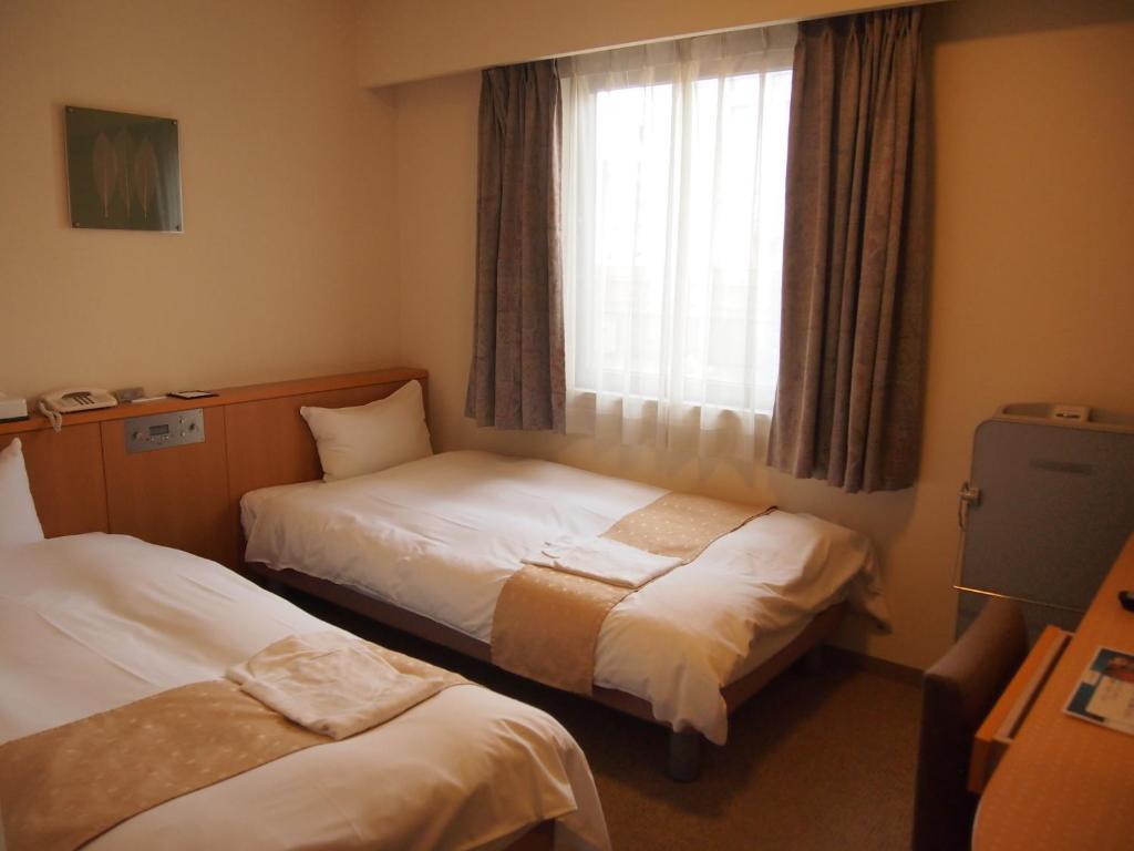Nest Hotel Κουμαμότο Δωμάτιο φωτογραφία